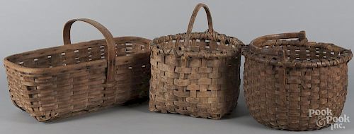 Three split oak baskets, 19th c., largest - 12'' h., 21 1/2'' w.