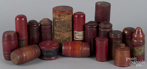 Red treen canisters, to include several with original advertising labels for Stafford's Fountain Pen