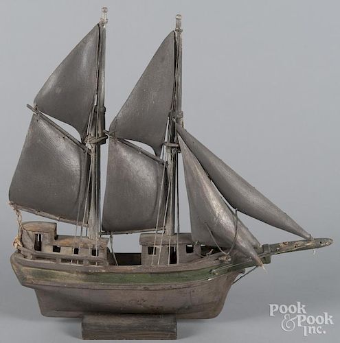 Carved and painted ship model, early 20th c., 16 1/2'' h., 17'' w.