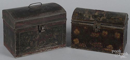 Two toleware dome lid boxes, 19th c., retaining their original stencil decoration, 7'' h., 9 3/4'' w.