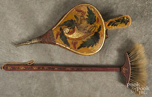 Painted hearth broom, 19th c., retaining its original floral decoration on a red ground, 22'' l.