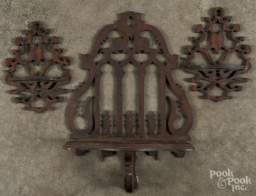 Three Victorian fretwork hanging shelves, largest - 14 3/4'' h., 10 1/4'' w.