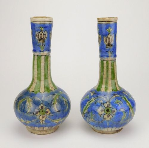 Pair of Persian tin glaze vases