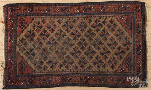 Beluch mat, early 20th c., 4'5'' x 2'9''.