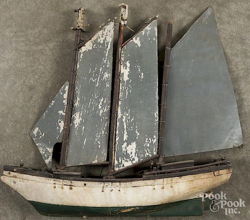 Carved and painted wood sailboat weathervane, ca. 1890, with sheet zinc sails, 21 1/2'' h., 23'' w.