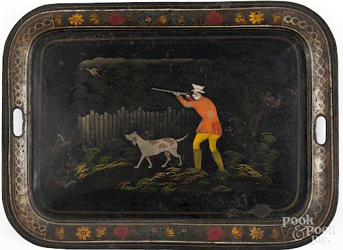 Tole decorated tray, 19th c., with a stenciled scene of a hunter and dog, 20 1/2'' l., 27 3/4'' w.
