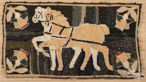 American hooked rug, 19th c., with two bridled horses, 20 1/2'' x 36 1/2''.