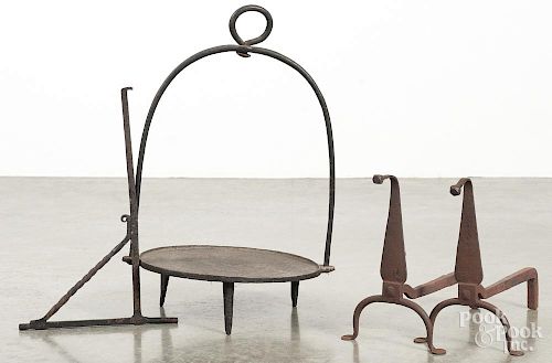 Wrought iron fireplace crane, 17'' l., together with a kettle rest, 23'' h. and a pair of andirons