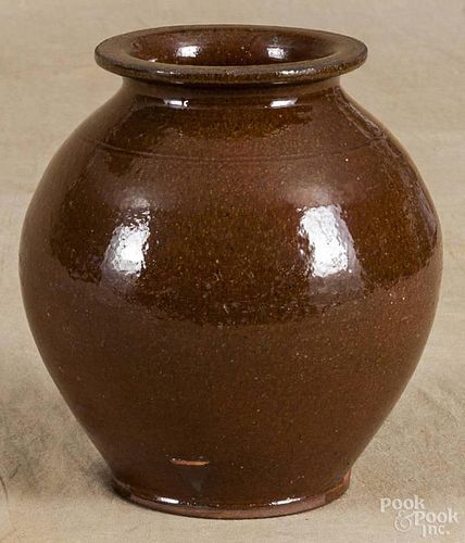 Pennsylvania redware ovoid jar, early 19th c., impressed 18 3/4 on underside, 7'' h.