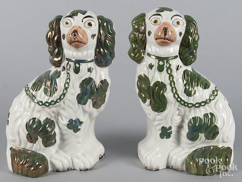 Pair of Staffordshire spaniels, 19th c., with rare green glaze, 10'' h.