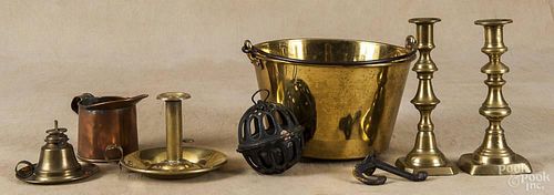 Group of brass, 19th/20th c., to include two candlesticks, a bucket, a saucer base candlestick