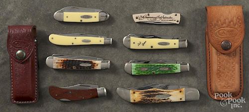Eight cased pocket knives.
