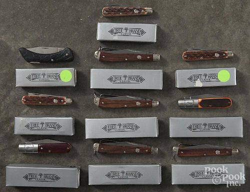 Ten Boker Tree Brand Classic pocket knives.