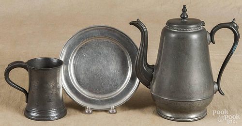 American pewter coffee pot, late 19th c., 10 1/2'' h., together with an American plate, 7 3/4'' dia.