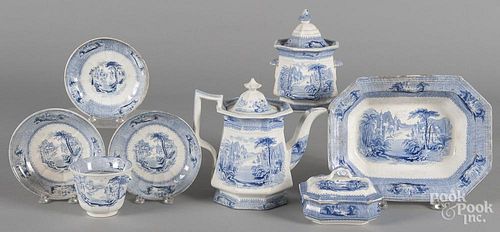 Blue Siam pattern Staffordshire, 19th c., to include a teapot, 9'' h., a covered sugar, a vegetable