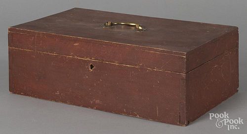 Stained pine lock box, 19th c., retaining an old red surface, 5'' h., 14 3/4'' w.
