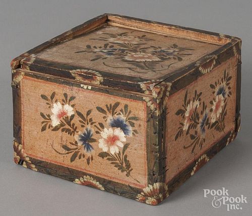 Painted pine slide lid box, 19th c., retaining its original floral decoration on a salmon ground