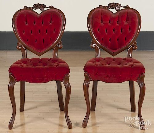 Pair of Victorian style side chairs with heart-shaped backs.