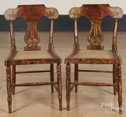 Pair of Sheraton painted cane seat chairs, 19th c.