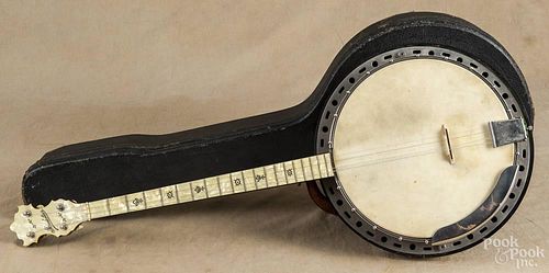Four-string banjo, 20th c., inscribed Mousketeer, 33 1/2'' l.