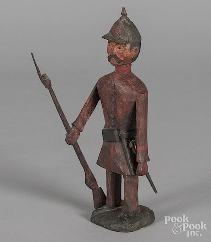 Keith Collis, carved and painted soldier, in the manner of Schimmel, 9 3/4'' h.