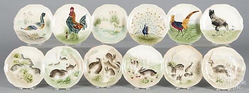 Twelve Choisy le roi porcelain plates with bird and animal decoration, 9'' dia.
