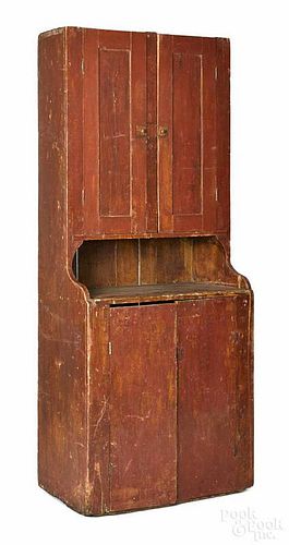 Pennsylvania painted pine stepback cupboard, 19th c., retaining an old red surface, 79'' h., 32'' w.