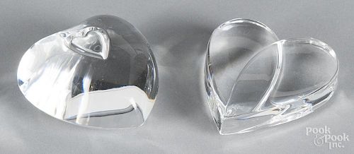 Two Steuben crystal hearts with original cloth bags and boxes, 2 1/2'' h. and 2 3/4'' h.