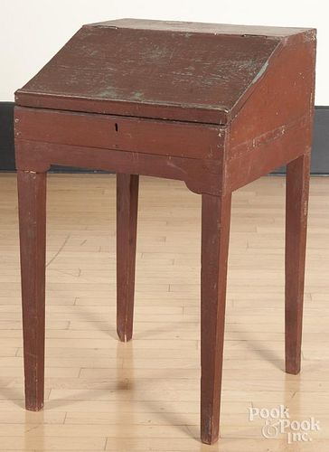Painted pine school desk, 19th c., retaining an old red/brown surface, 33 3/4'' h., 20'' w.