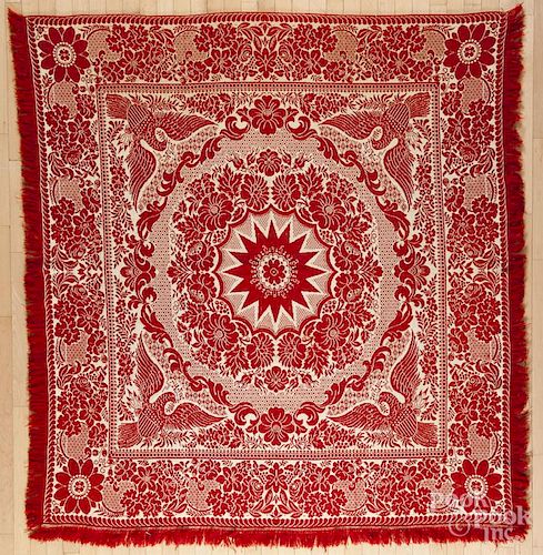 Red and white jacquard coverlet, ca. 1840, with eagle corners, 80'' x 75''.