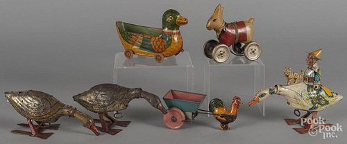 Tin litho toys, to include a Marx wind-up mother goose, 7 1/4'' h., a rabbit pull toy, 5'' l.