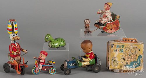 Tin litho toys, to include a Western Germany wind-up duck on a tricycle, 8 1/4'' h.