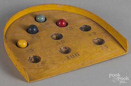 Wooden ball toss game, late 19th c., 13'' d.