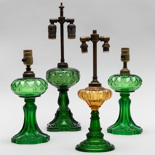 Group of Four Green Glass Fluid Lamps