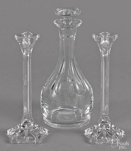 Colorless glass decanter, 10 1/4'' h., together with a pair of candlesticks, 9'' h.