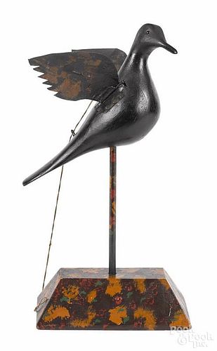 Carved and painted articulated bird, early 20th c., with tin wings which move by pulling a string
