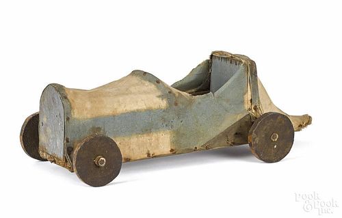 Painted wood and canvas boat tail race car, early 20th c., 18'' l.