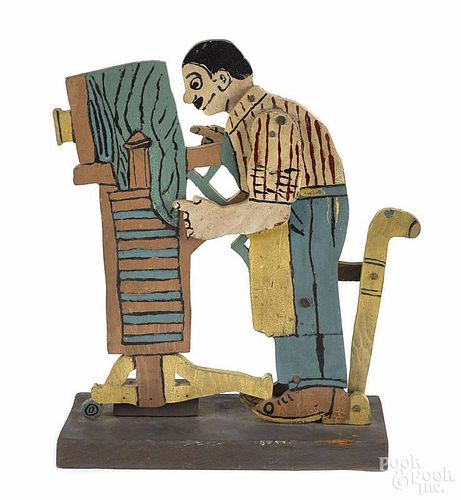 Painted and carved articulated photographer, early 20th c., with a head and arms that move