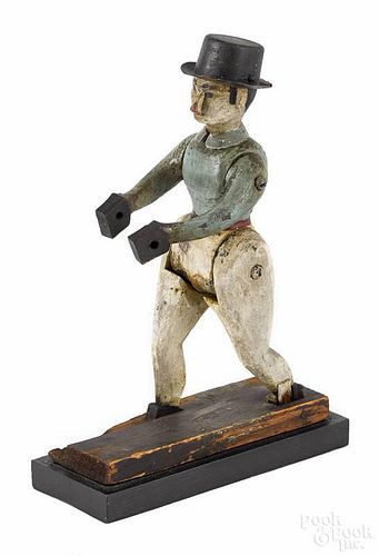 Carved and painted wood and tin figure of a gentleman, 19th c., 10'' h.