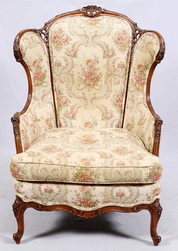 CONTINENTAL-STYLE CARVED WALNUT WINGBACK ARMCHAIR