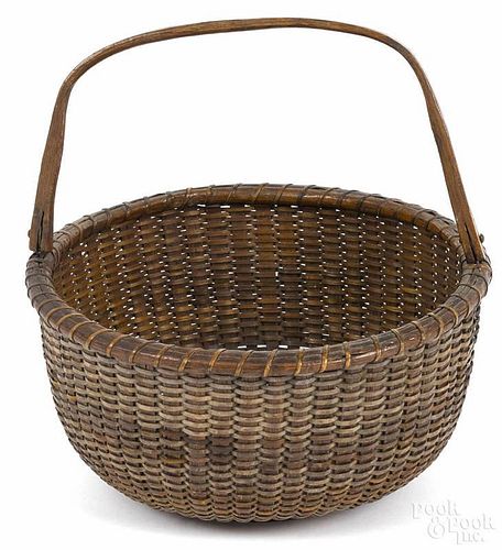 Nantucket lightship basket, 19th c., with a swing handle, attributed to Charles Ray, 8 1/2'' h.
