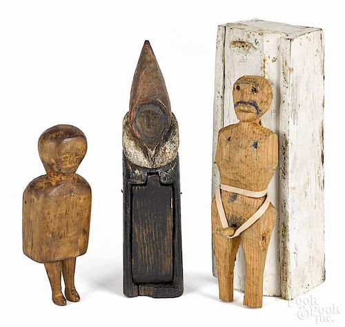 Three carved pine erotica figures, early 20th c., one of a painted monk