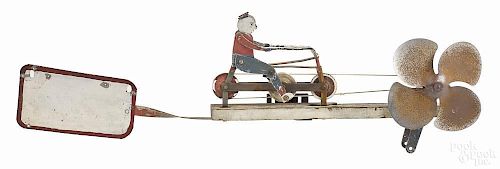 Painted wood, iron and tin bicycle whirligig, 20th c., overall - 42'' l.