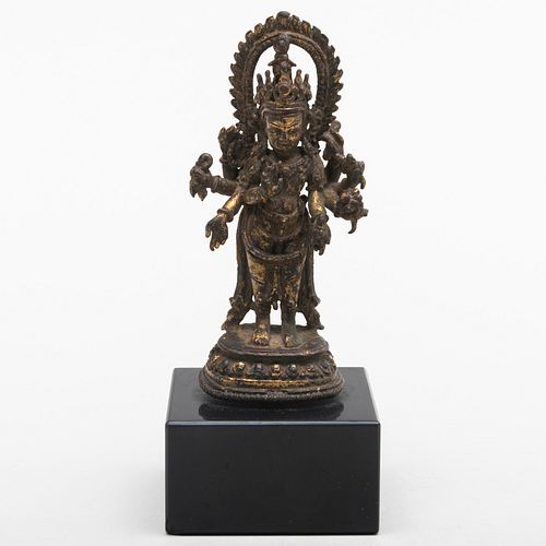Small Nepalese Gilt-Copper Figure of Amoghapasha