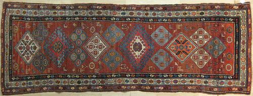Caucasian runner, early 20th c., with medallions o