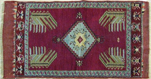 Three oriental mats, early 20th c., 3'1" x 2'4", 3