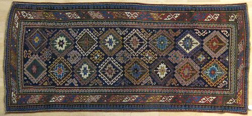 Kazak carpet, ca. 1900, with repeating medallionsn
