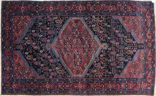 Malayer carpet, ca. 1930, with a central red medal