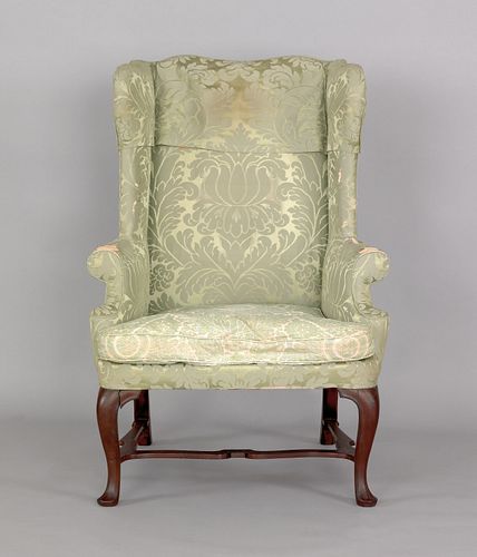 Queen Anne mahogany easy chair, ca. 1745, with ser