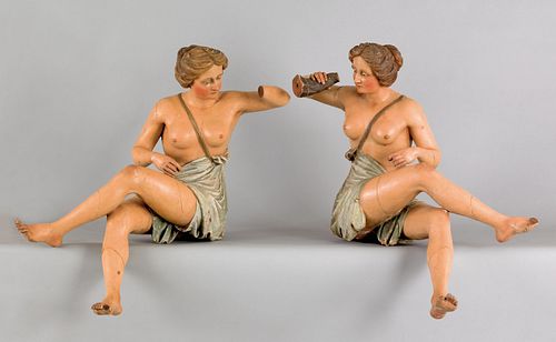 Exceptional pair of carved and painted female nude